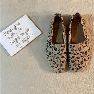 Tan Toms with a Flower Design